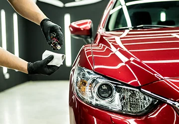 car-service-worker-applying-nano-coating-car-detail